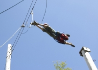 Denis leaps for rope