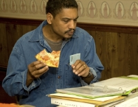 ponders data over pizza
