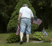 Mark distributes flags