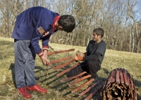 Ben and Will replace slats in fence